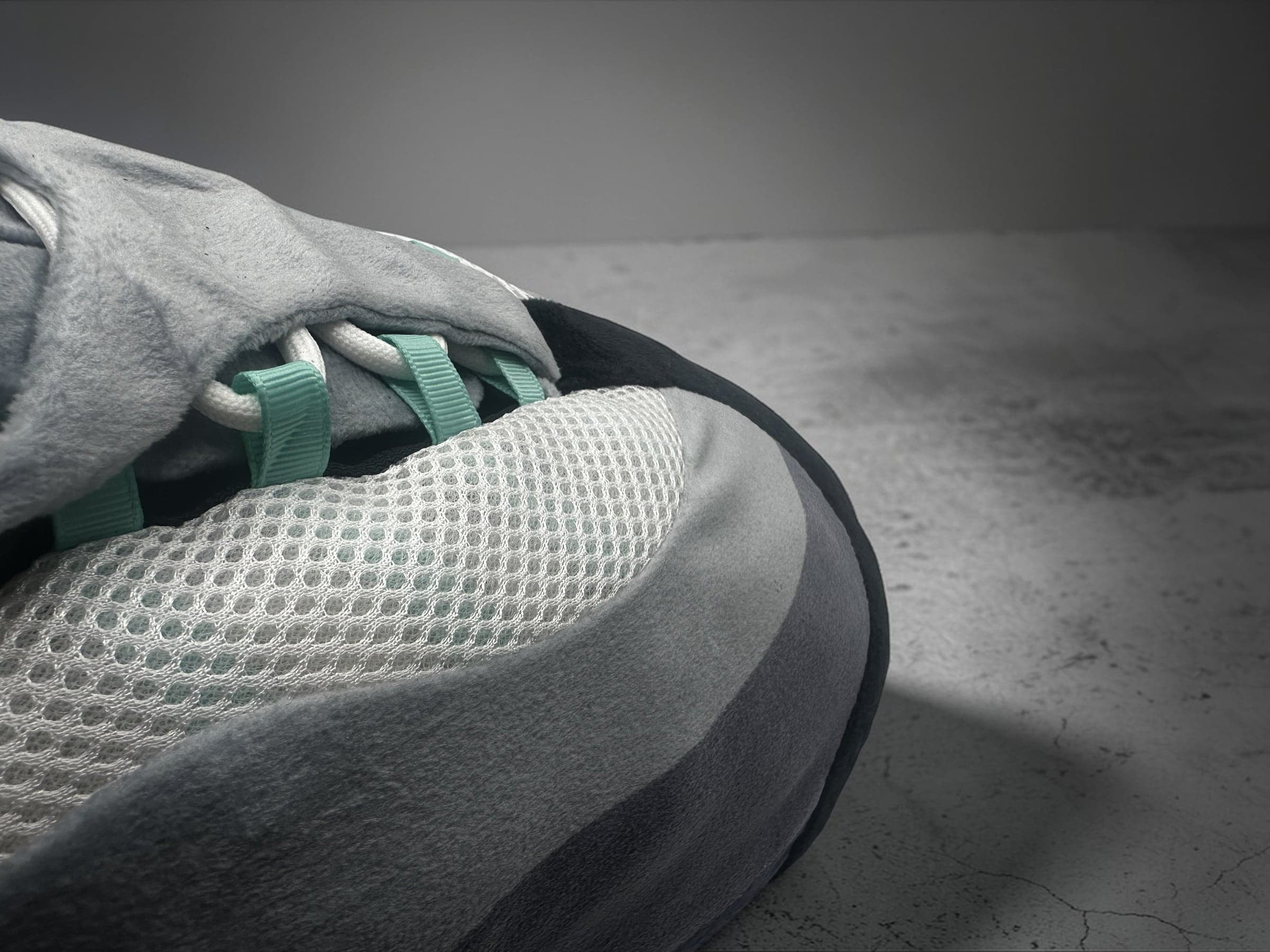 Macro of the honeycomb mesh-look panel and turquoise loops